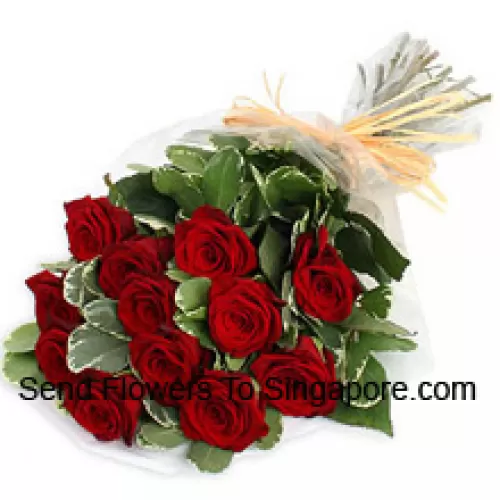 A Beautiful Bunch Of 12 Red Roses With Seasonal Fillers