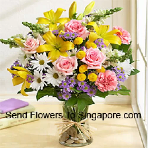 Pink Roses, Pink Carnations, White Gerberas And Yellow Lilies With Seasonal Fillers In A Glass Vase